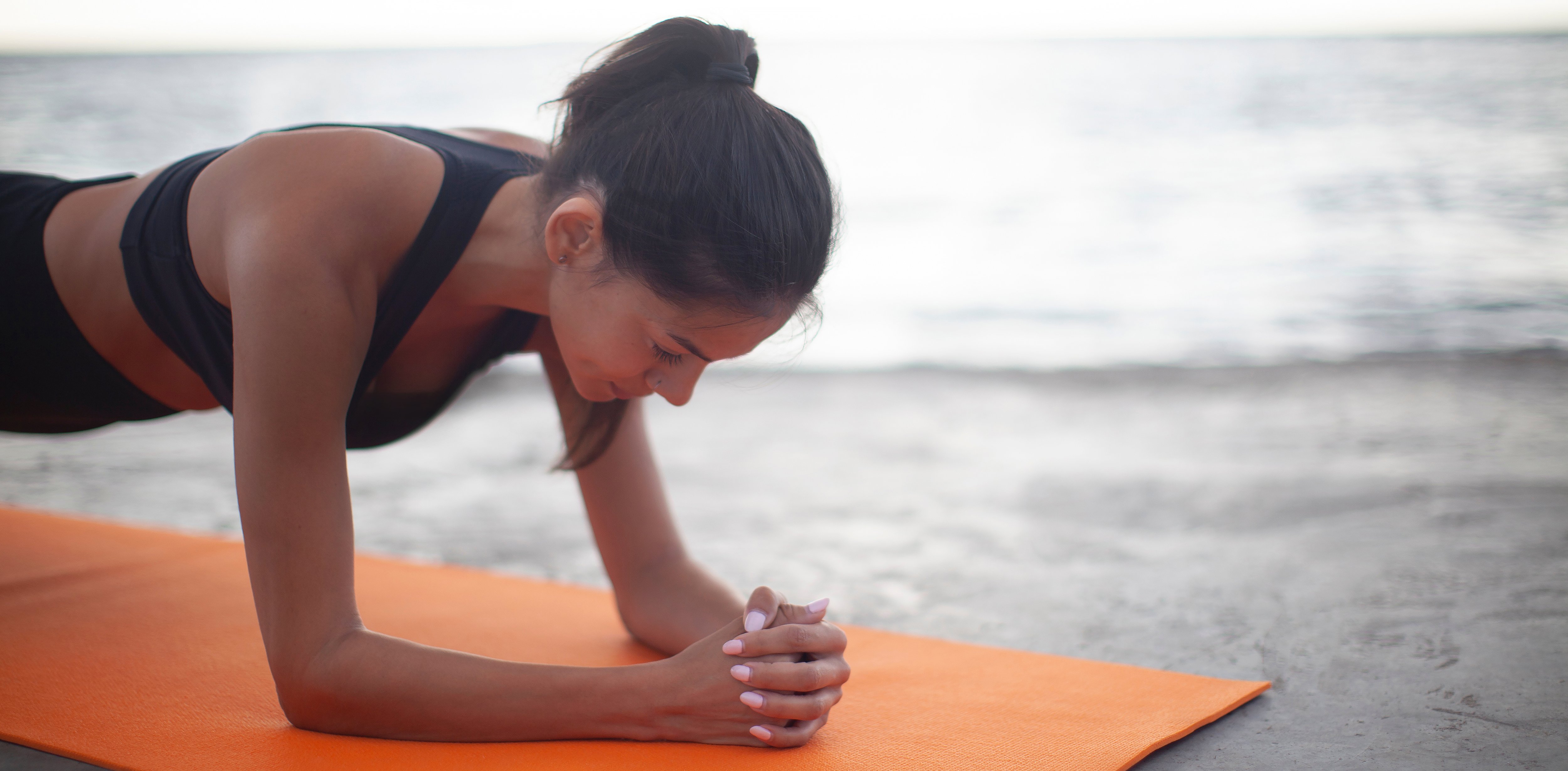 women in yoga pose